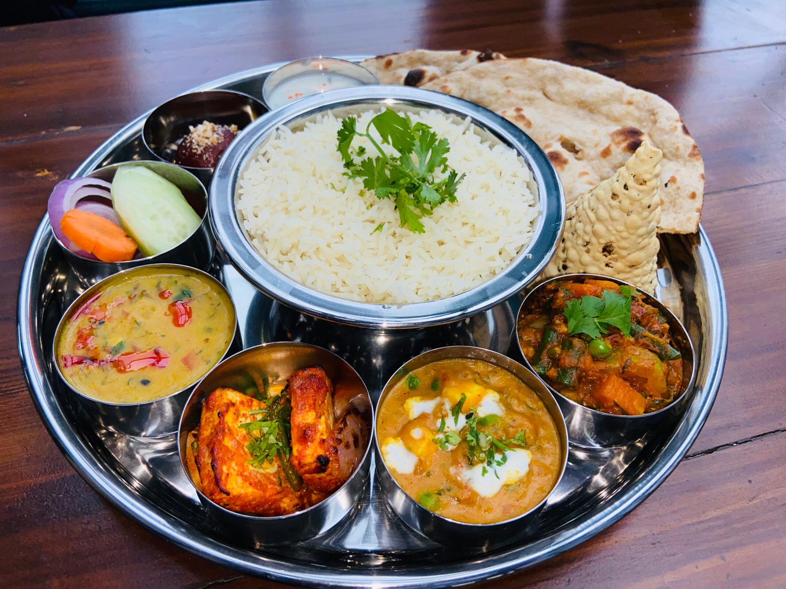 Regional Thali Showdown: Punjabi, Rajasthani & Gujarati Flavors at The Dhaba Co.
